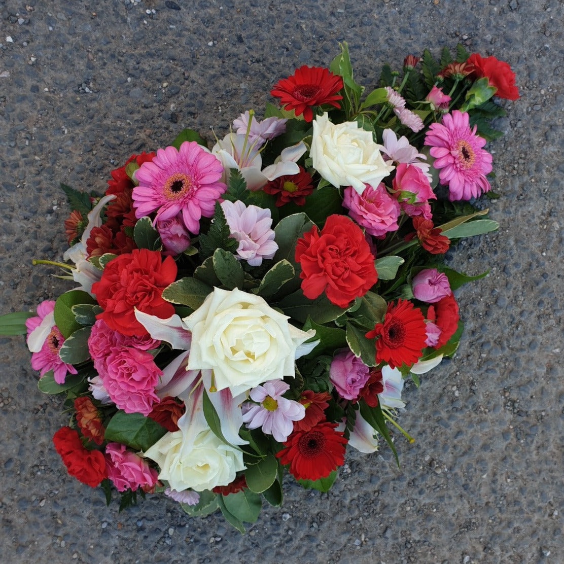 Red, Pink & White Seasonal SprayFuneral Tribute